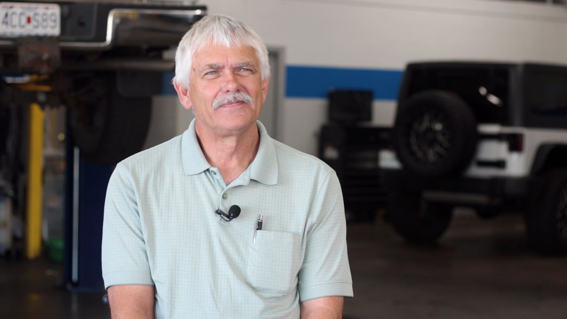 Marvin Gott smiling in his transmission shop in Springfield MO.