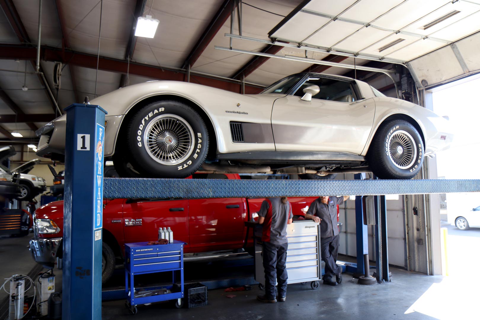 A classic Chevrolet Corvette in an auto repair shop in Springfield MO.